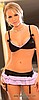Conjunto falda con liguero, sujetador y tanga Seducción